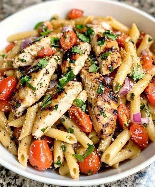 Bruschetta Chicken Pasta with juicy chicken, fresh tomatoes, basil, garlic, Parmesan, and balsamic glaze